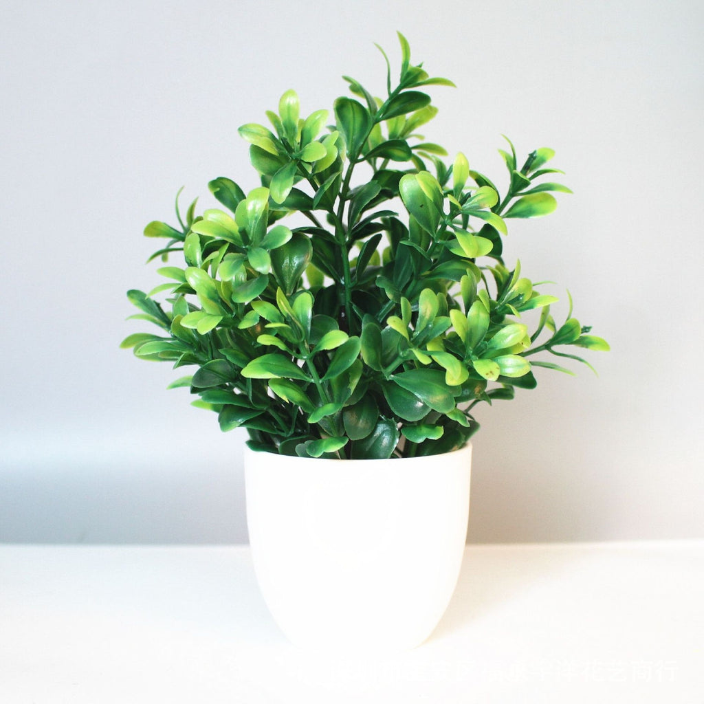 Mini Potted Faux Plant on a shelf