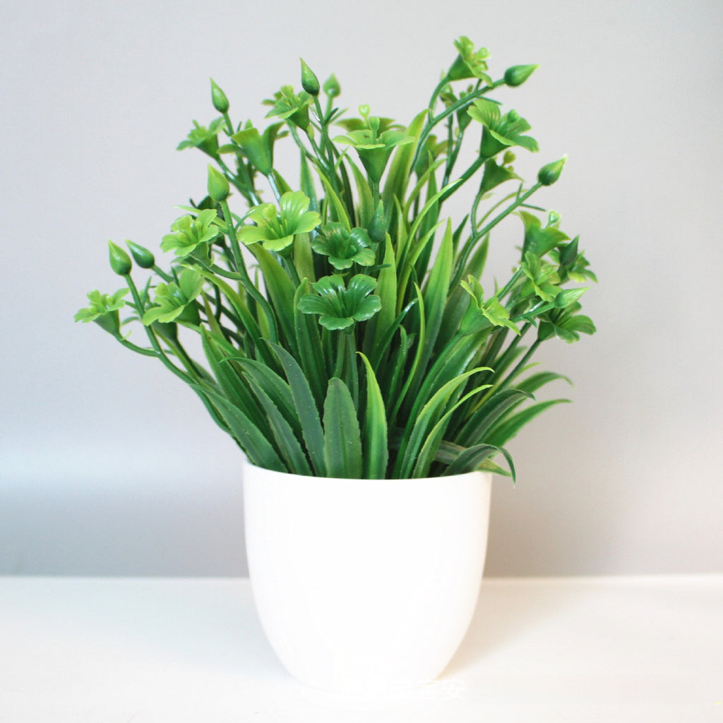 Mini Potted Faux Plant on a shelf