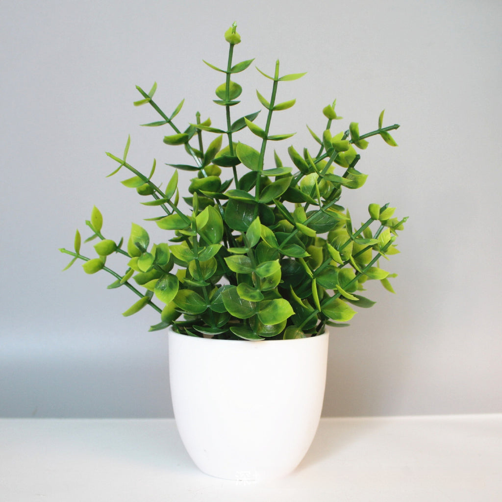 Mini Potted Faux Plant on a shelf