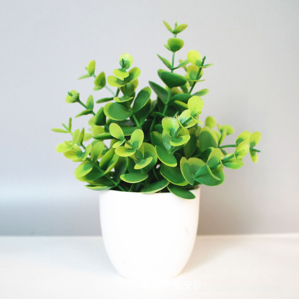 Mini Potted Faux Plant on a shelf