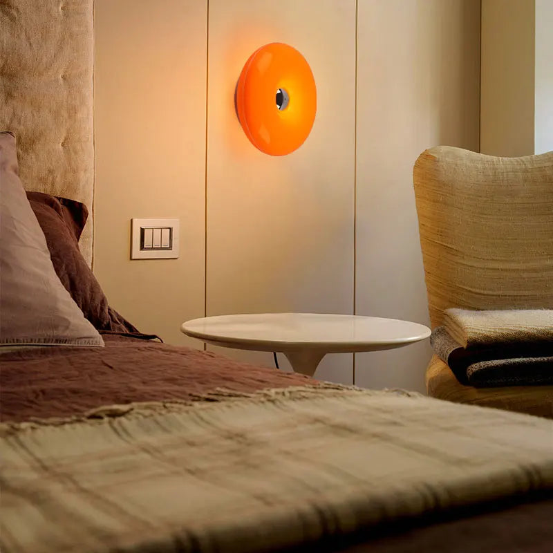 Donut Wall Lamp glowing on a wall