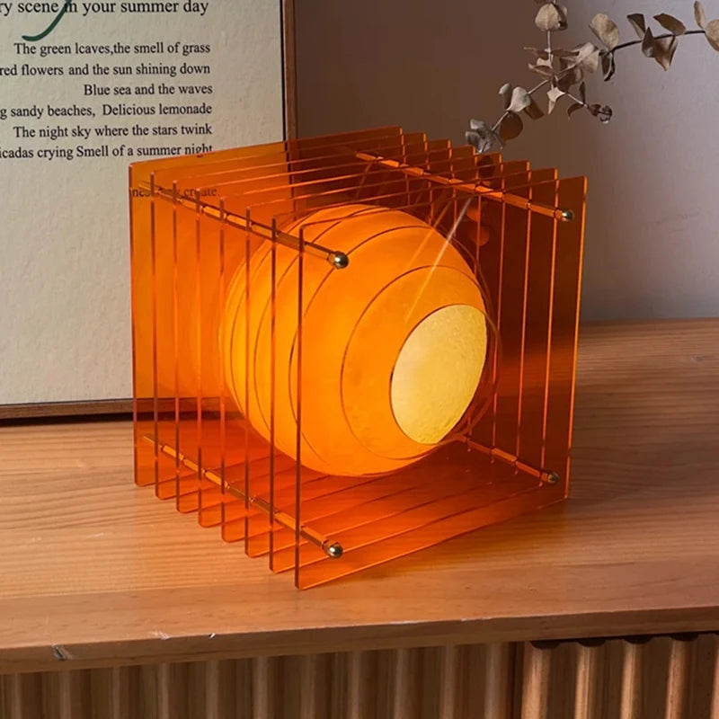 Tiered Acrylic Moon Lamp glowing on a nightstand