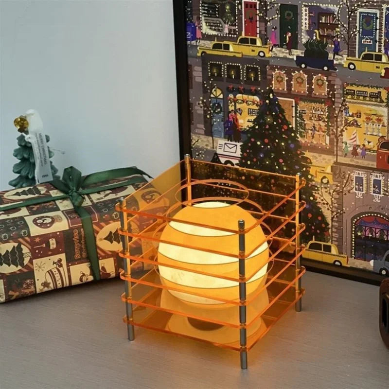 Tiered Acrylic Moon Lamp glowing on a nightstand