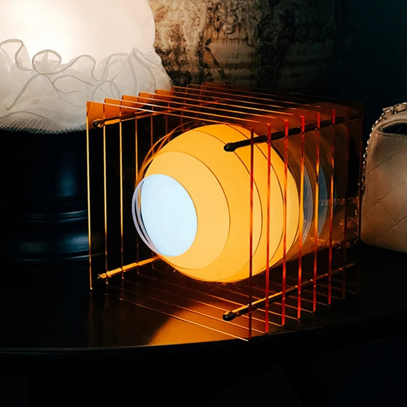 Tiered Acrylic Moon Lamp glowing on a nightstand
