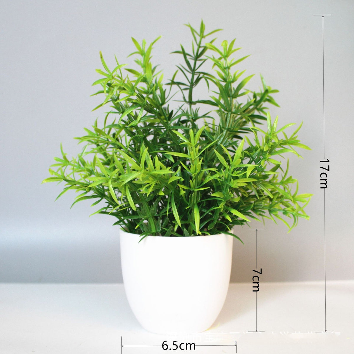 Mini Potted Faux Plant on a shelf