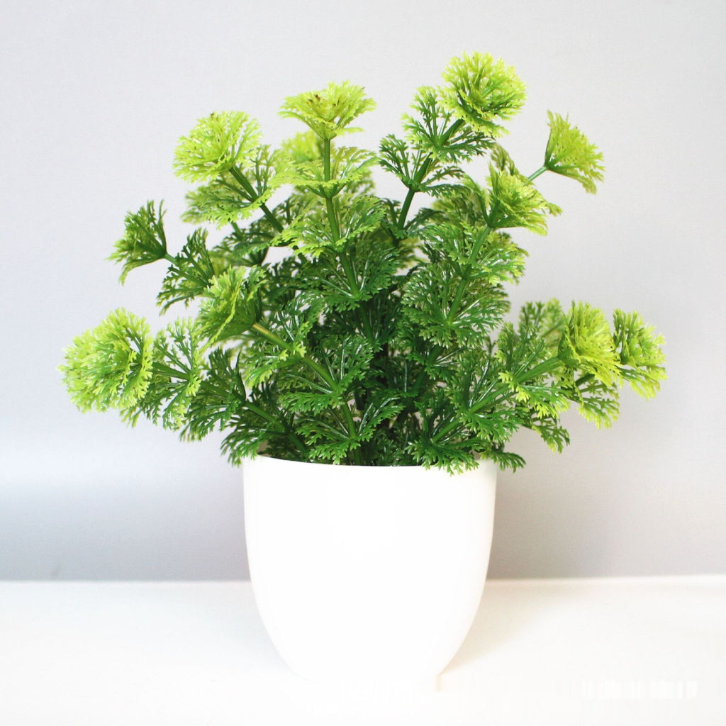 Mini Potted Faux Plant on a shelf